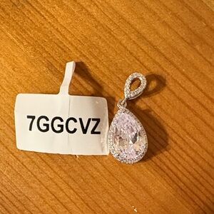 Triple Stone Silver Pendant And A Teardrop Pendant